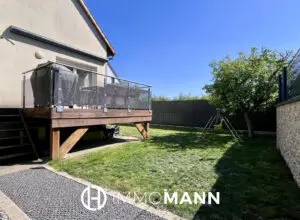 Triplex avec jardin et garage