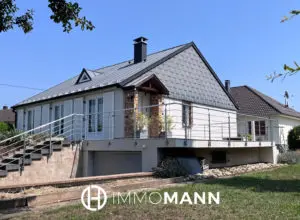 Grande maison familiale avec jardin arboré